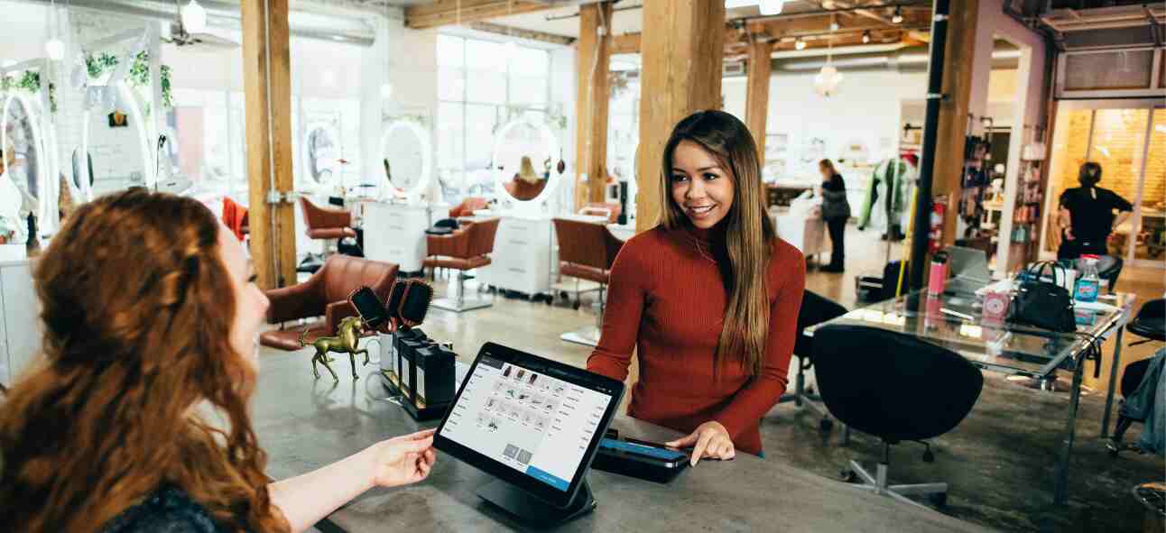 A customer paying at the counter